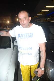 Sanjay Dutt and sumo wrestler Yamamotayama at airport as they enter