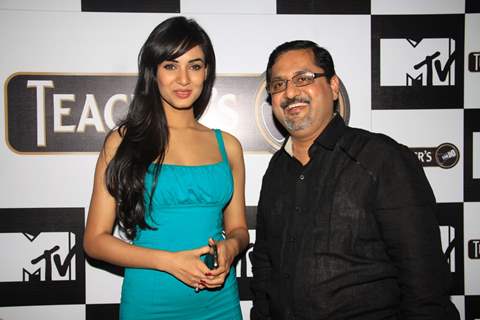 Sonal Chauhan with Harish Moolchandani, CEO of Beam India at the launch of Teacher's CAN DO