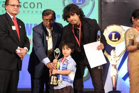 Sonu Niigam with son Nevaan Niigam at 18th LIONS GOLD AWARDS at Bhaidas Hall in Mumbai