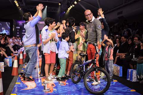 Kids walk on the ramp for Hotwheels designed by Narendra Kumar at India Kids Fashion Week in Mumbai