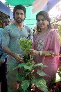 Farhan Akhtar plants a tree with Shaina NC