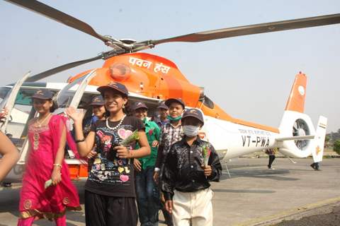 Cancer affected little patients on World Cancer Day after their free joy ride on helicopter at Mumba