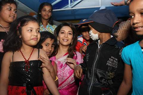 Madhuri Dixit Nene interacts with Cancer affected little patients on World Cancer Day organised by Pawan Hans at Juhu, Mumbai