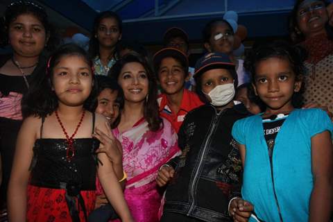 Madhuri Dixit Nene interacts with Cancer affected little patients on World Cancer Day organised by Pawan Hans at Juhu, Mumbai