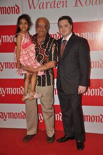 Gautam Singhania with his dad and daughter at Raymonds new store at Warden Road. .