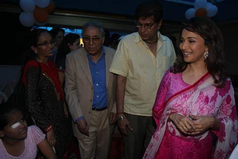 Madhuri Dixit Nene interacts with Cancer affected little patients on World Cancer Day organised by Pawan Hans at Juhu, Mumbai