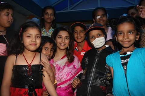 Madhuri Dixit Nene interacts with Cancer affected little patients on World Cancer Day organised by Pawan Hans at Juhu, Mumbai