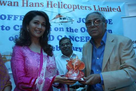 Madhuri Dixit Nene interacts with Cancer affected little patients on World Cancer Day organised by Pawan Hans at Juhu, Mumbai