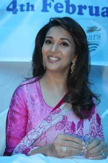 Madhuri Dixit Nene interacts with Cancer affected little patients on World Cancer Day organised by Pawan Hans at Juhu, Mumbai