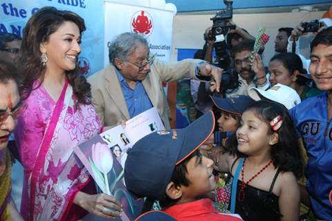 Madhuri Dixit Nene interacts with Cancer affected little patients on World Cancer Day organised by Pawan Hans at Juhu, Mumbai