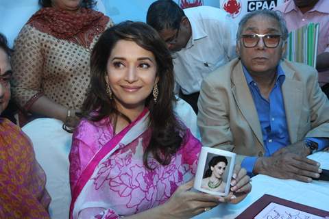 Madhuri Dixit Nene interacts with Cancer affected little patients on World Cancer Day organised by Pawan Hans at Juhu, Mumbai