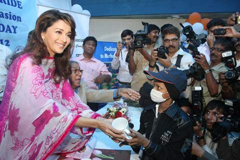 Madhuri Dixit Nene interacts with Cancer affected little patients on World Cancer Day organised by Pawan Hans at Juhu, Mumbai