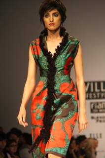A model displays a creation by designer James Ferreira at the Wills Lifestyle India Fashion week 2012,in New Delhi on Wednesday. .