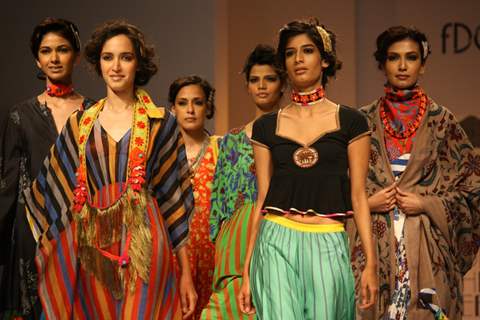 Models displays  creations by designer Anupama Dayal at the Wills Lifestyle India Fashion week 2012,in New Delhi on Wednesday. .