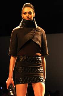 A model displays a creation by designer Kanika Saluja Choudhry at the Wills Lifestyle India Fashion week 2012,in New Delhi. .