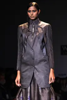 A model displays a creation by designer Arjun at the Wills Lifestyle India Fashion week 2012,in New Delhi .