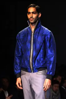 A model displays a creation by designer Arjun at the Wills Lifestyle India Fashion week 2012,in New Delhi .