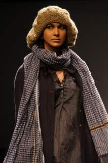 A model displays a creation by designer Aneeth Arora at the Wills Lifestyle India Fashion week 2012,in New Delhi.  .