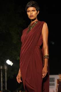 A model displays a creation by designer Tarun Tahiliani at the Wills Lifestyle India Fashion week 2012,in New Delhi on Thursday. .