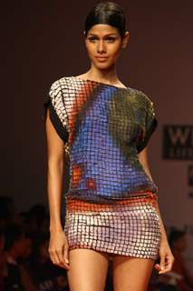 A model displays a creation by designers Pankaj and Nidhi at the Wills Lifestyle India Fashion week 2012,in New Delhi on Friday. .