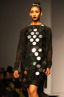 A model displays a creation by designers Abraham & Thakore at the Wills Lifestyle India Fashion week 2012,in New Delhi on Friday. .