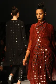 A model displays a creation by designers Abraham & Thakore at the Wills Lifestyle India Fashion week 2012,in New Delhi on Friday. .