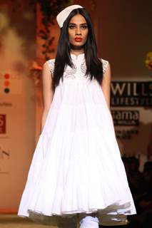 A model displays a creation by designer Ashish Soni  during a special show at the Wills Lifestyle India Fashion week 2012,in New Delhi on Friday. .