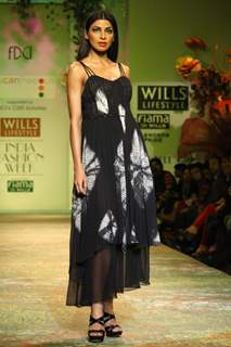 A model displays a creation by designer Ravi Bajaj  during a special show at the Wills Lifestyle India Fashion week 2012,in New Delhi on Friday. .