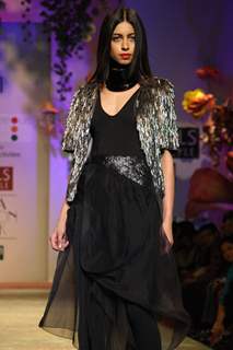 A model displays a creation by designers Rohit Gandhi Rahul Khanna during a special show at the Wills Lifestyle India Fashion week 2012,in New Delhi on Friday. .