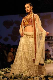 A model displays a creation by designer Rocky S at the Wills Lifestyle India Fashion week 2012,in New Delhi on Saturday. .