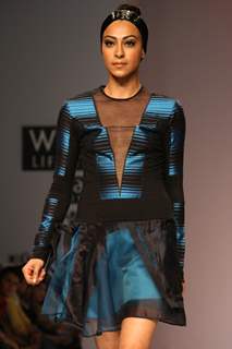 A model displays a creation by designer Rahul Mishra at the Wills Lifestyle India Fashion week 2012,in New Delhi on Saturday. .