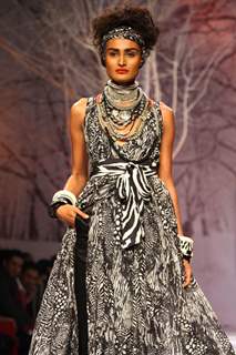 A model displays a creation by designer Payal Jain at the Wills Lifestyle India Fashion week 2012,in New Delhi on Saturday. .