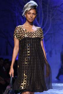 A model displays a creation by designer Sanchita at the Wills Lifestyle India Fashion week 2012,in New Delhi on Saturday. .