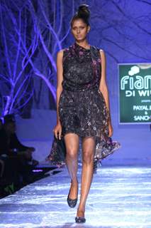 A model displays a creation by designer Sanchita at the Wills Lifestyle India Fashion week 2012,in New Delhi on Saturday. .
