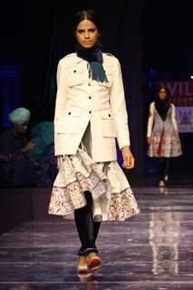 A model displays a creation by designer JJ Valaya at the Grand Finale of Wills Lifestyle India Fashion week 2012,in New Delhi on Sunday. .
