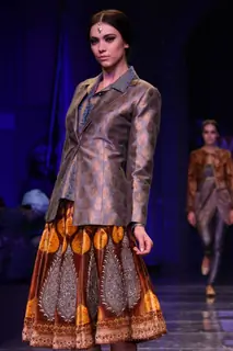 A model displays a creation by designer JJ Valaya at the Grand Finale of Wills Lifestyle India Fashion week 2012,in New Delhi on Sunday. .