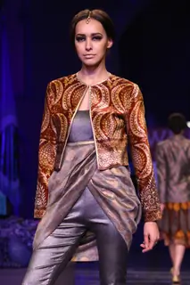 A model displays a creation by designer JJ Valaya at the Grand Finale of Wills Lifestyle India Fashion week 2012,in New Delhi on Sunday. .