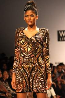 A model displays a creation by designer ReynuTaandon at the  Wills Lifestyle India Fashion week 2012,in New Delhi on Sunday. .