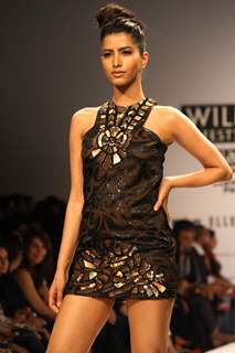 A model displays a creation by designer ReynuTaandon at the  Wills Lifestyle India Fashion week 2012,in New Delhi on Sunday. .