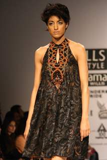 A model displays a creation by designer ReynuTaandon at the  Wills Lifestyle India Fashion week 2012,in New Delhi on Sunday. .