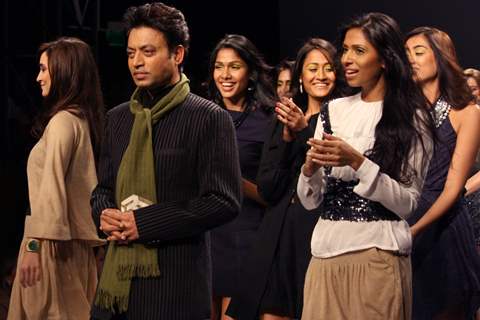 Bollywood actor Irfan Khan displays a creation by designer Meera Ali at the  Wills Lifestyle India Fashion week 2012,in New Delhi on Sunday. .