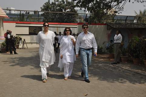 Madhuri Dixit with her husband Dr. Sriram at Mona Kapoor's funeral at Pawan Hans