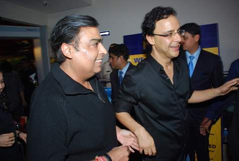 Vidhu Vinod Chopra and Mukesh Ambani at premiere of film Parinda at PVR. .