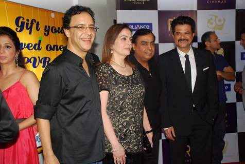 Vidhu Vinod Chopra and Anil Kapoor with Mukesh Ambani and wife Neeta Ambani at premiere of film Parinda at PVR. .