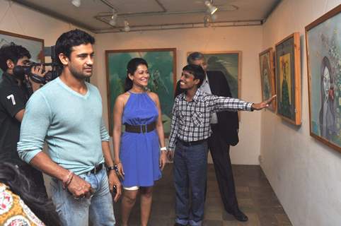 Payal Rohatgi with wrestler Sangram Singh inaugurates Art Exhibition at Coomaraswamy Hall