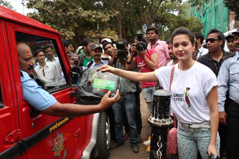 Bollywood actress Isha Sharwani supports the Go Green Initiative at CST in Mumbai