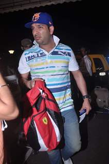 Cricketer Yuvraj Singh leave for 13th IIFA awards to Singapore at International Airport. .