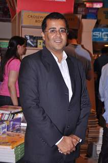 Writer Chetan Bhagat Mercedez Benz magazine anniversary issue launch in Crossword Mumbai .