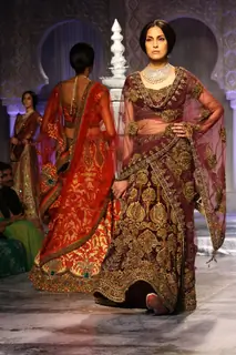 Models showcases a creation by designer JJ Valaya show at the Delhi Couture Week 2012, in New Delhi on Wednesday. .