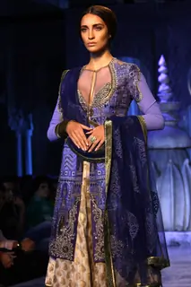 A model showcases a creation by designer JJ Valaya show at the Delhi Couture Week 2012, in New Delhi on Wednesday. .